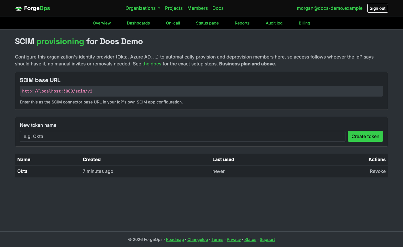 The SCIM provisioning settings for an organization, showing the base URL and token list